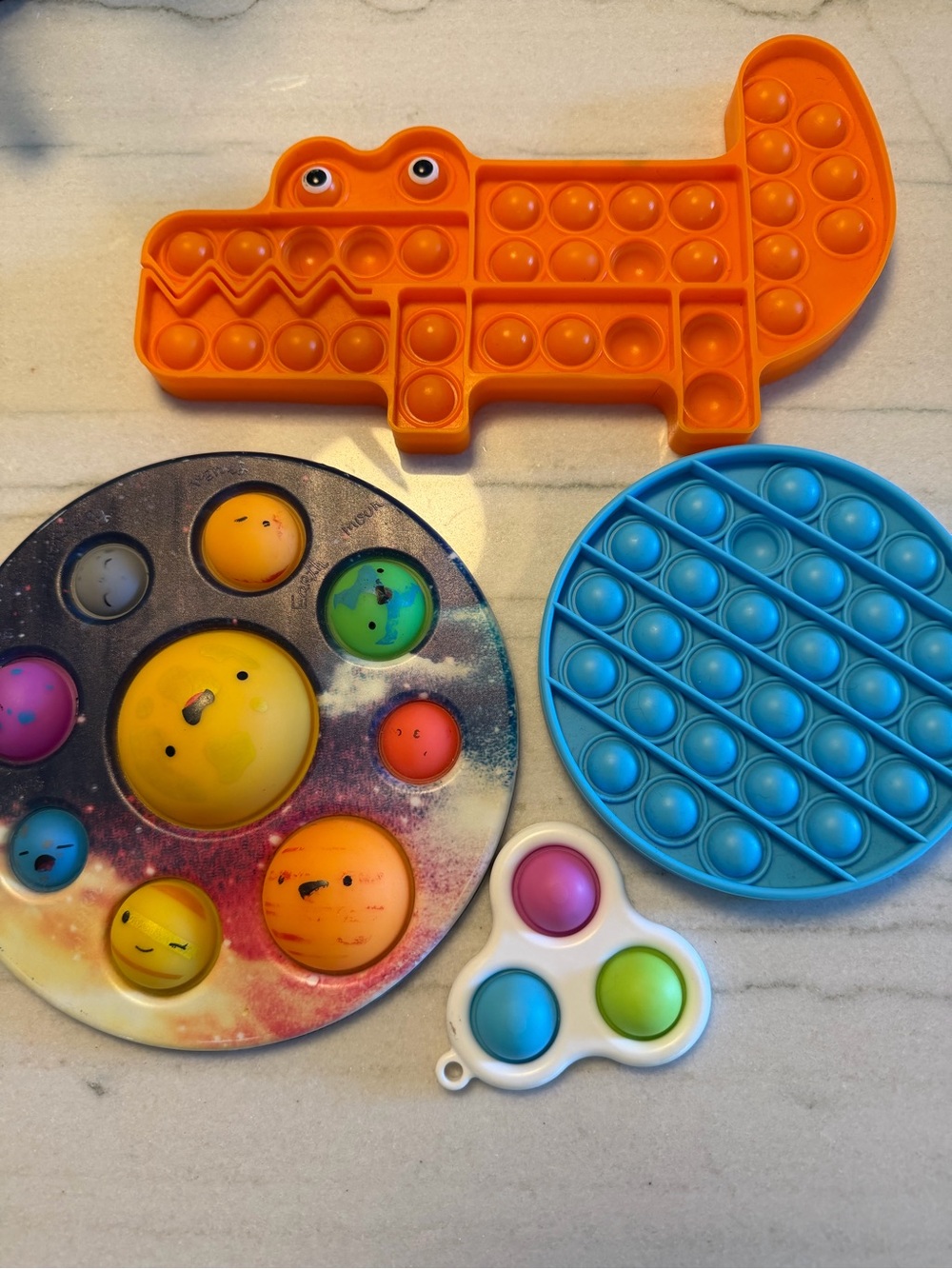 Pop-it! Assorted Kids' Sensory Fidget Toy Set - Orange, Blue, Multicolor